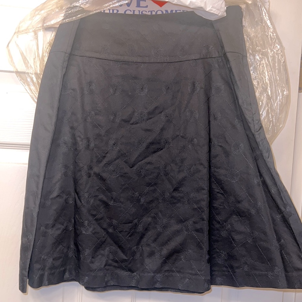 The limited black like new condition skirt  no flaws stains rips or tears